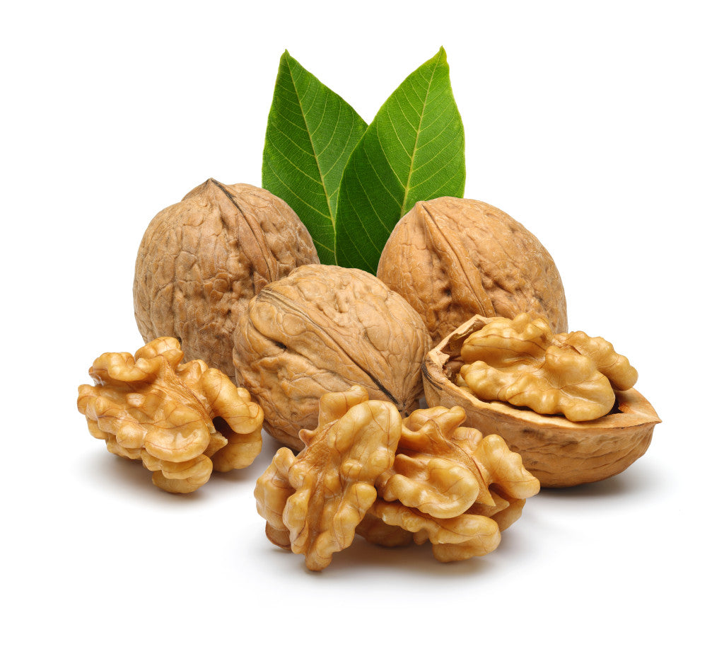 Walnuts in shell and some out of shell nuts